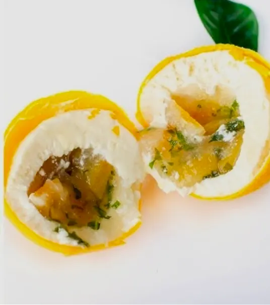Lemon trompe-l'œil cut open, candied curd interior